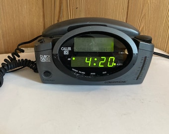Conair™ full-service landline telephone alarm clock radio.
