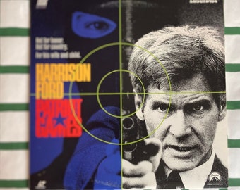 President Ford presents ‘PATRIOT GAMES’ on a Paramount Home Video laserdisc.