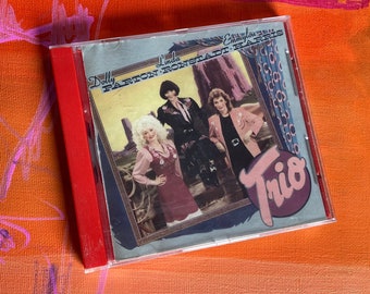 Parton/Ronstadt/Harris ‘TRIO’ on a Warner Brothers compact disc.