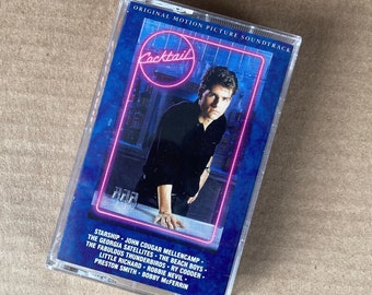 Beach Boys, Fabulous, Thunderbirds, et. al. ‘COCKTAIL’ original motion picture soundtrack on an Elektra audio cassette.