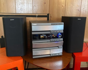 Yamaha Natural Sound™ GX-500 cassette’ing/compact disc changing stereo system [plus].