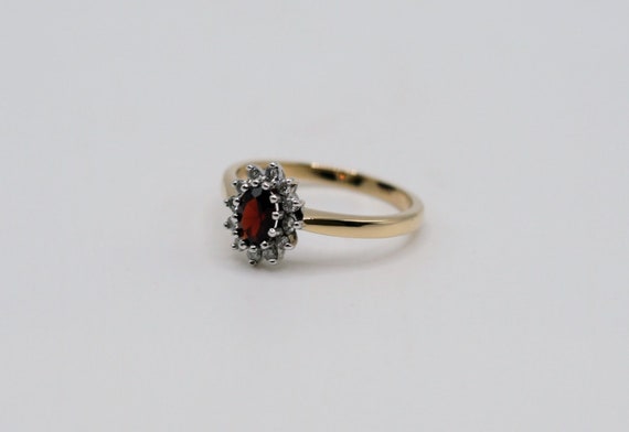 NEW: 9ct gold garnet and diamond cluster ring - image 6