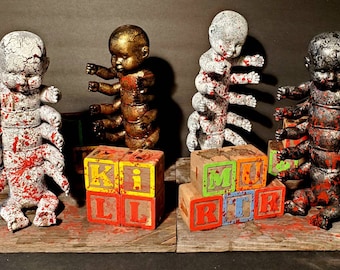 Cursed Centipede Baby Doll display with Haunted Blocks