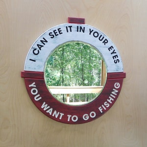 20-inch distressed wood Bobber Mirror