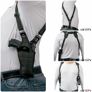 May include: Black leather shoulder holster with a quilted design. The holster is worn over the shoulders and secured with adjustable straps. The image shows the holster from multiple angles, highlighting its design and fit.