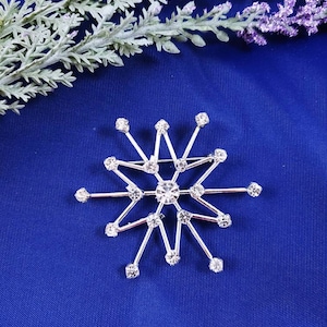 Vintage Rhinestone Snowflake Brooch: Silver Tone Christmas Pin