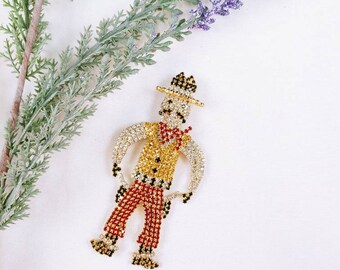 Vintage Dueling Cowboy Brooch: Gold Tone Western Rodeo Pin
