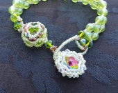 Glass and crystal adjustable bracelet with rainbow crystal rivoli focal