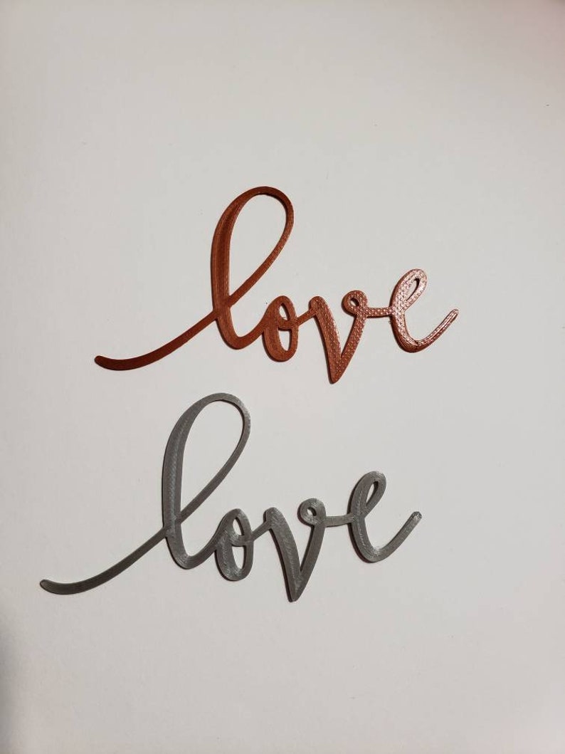 3D printed word Love