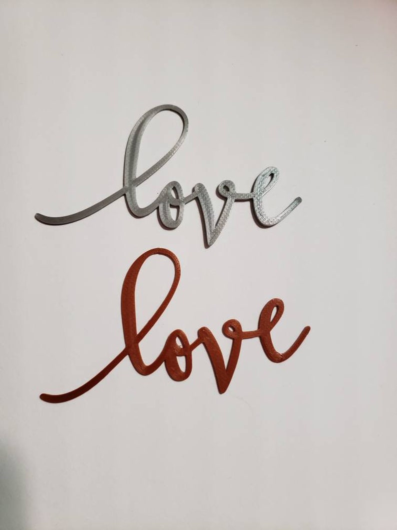 3D printed word Love