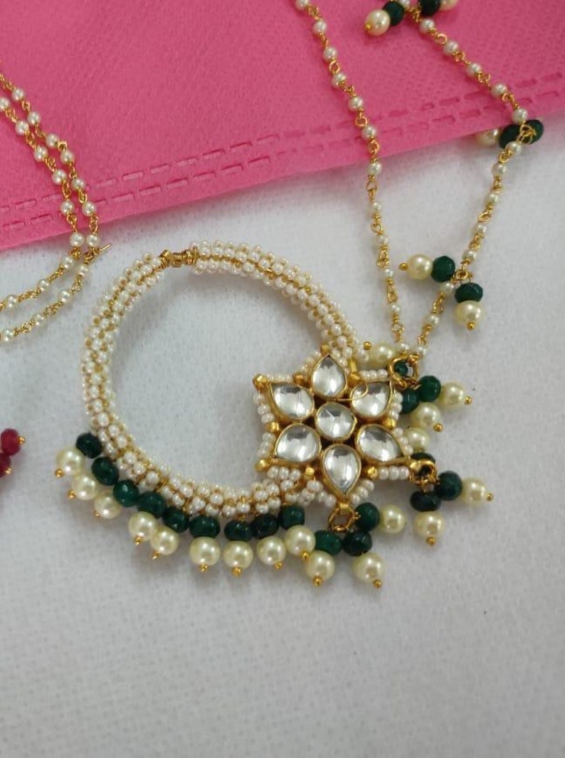 Nose Ring With Chain,
Bollywood Jewelry,
Ethnic Jewelry,
Nath,
Desi Nath,
Pakistani Jewelry,
Nose Pin,
Nathini,
Pressed Earring,
Nathni,
Non Pierced,
Non Piercing,
Gold Plated,
Maharashtrian,
Clipon,
Marathi Nath,
Festival Jewelry,
Bijoux Jewelry,