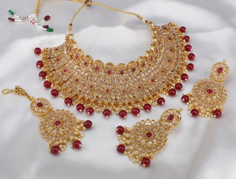 Jadau Jewelry,
Victorian Choker,
Necklace Set,
Pakistani Bridal,
Indian Bridal
Emerald Necklace,
Victorian Jewelry,
Emerald Doublet,
Emerald Diamond,
Long Kundan Necklace,
Polki Long Necklace,
Sabhyasachi Necklace,
Polki Jewelry Set,
Pearl Kundan,