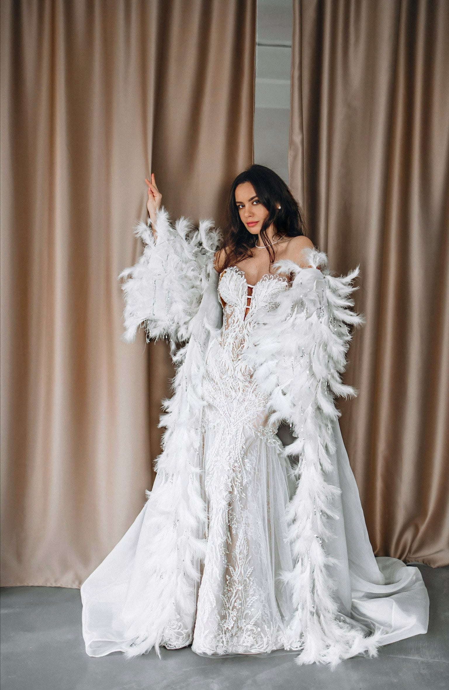 bohemian feather wedding dress Elegant Long Sleeve Feather-Trimmed Modest Wedding Dress  HAREM's Brides