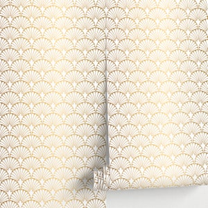 May include: Gold and white wallpaper with a repeating pattern of overlapping fan shapes.