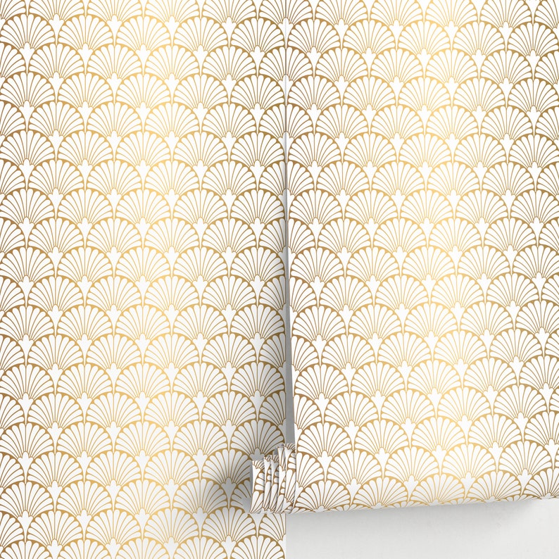 May include: Gold and white wallpaper with a repeating pattern of overlapping fan shapes.