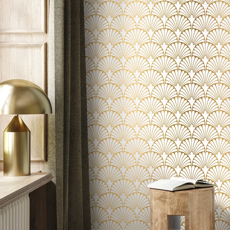 May include: White wallpaper with a gold geometric pattern of overlapping fan shapes.