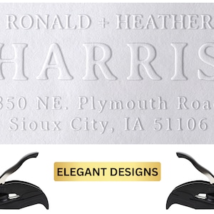 May include: White return address stamp with the text "RONALD + HEATHER HARRIS 850 NE. Plymouth Road Sioux City, IA 51106" and the text "ELEGANT DESIGNS" in gold lettering. The stamp is shown with two black self-inking stampers.