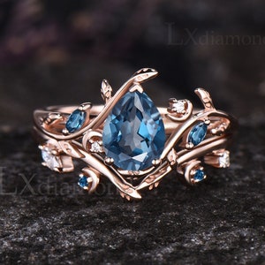 Einzigartige Birne Cut Dezember Birthstone Natürliche London Blauer Topas Verlobungsring Set Art Deco Mond Blatt Natur Inspiriert Ring Weihnachtsschmuck