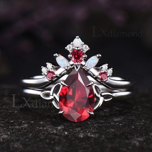 Teardrop Ruby Engagement Ring Set Unique July Birthstone Red Gemstone Celtic Knot Solitaire Ring 14k White Gold Opal Curved Wedding Band