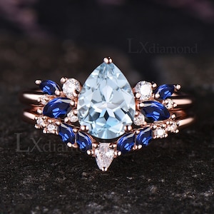 Birnen-Schnitt natürlicher Aquamarin-Verlobungsring-Set Einzigartige Marquise-blauer Saphir-Cluster-Hochzeitsring