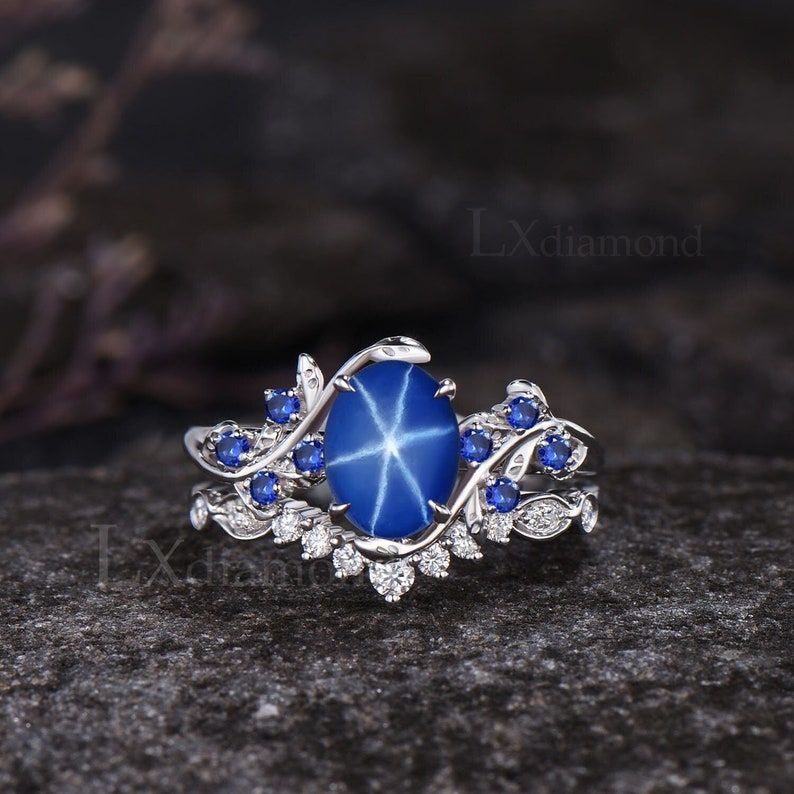 Vintage Oval Cut Star Blue Sapphire Engagement Ring Set Unique September Birthstone Blue Sapphire Ring Art Deco Leaf Nature Inspired Ring 2pcs Bridal Ring Set