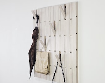 Wall coat rack. Covered with white oil wax