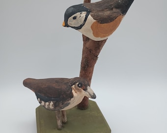 Songbirds, two together on a real branch affixed to a base, like Springtime!
