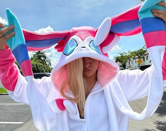 Pink Ribbon Kigurumi Pajamas – Ultra-Soft Fleece for Loungewear, Cosplay and Sleepwear | Fantasy Creature Design