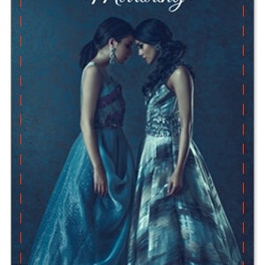 May include: Two women in long, flowing blue dresses stand facing each other, their heads touching. The text "Mirroring" is above them, and the text "A Mirrage Calling For You To Go Within" is below them.