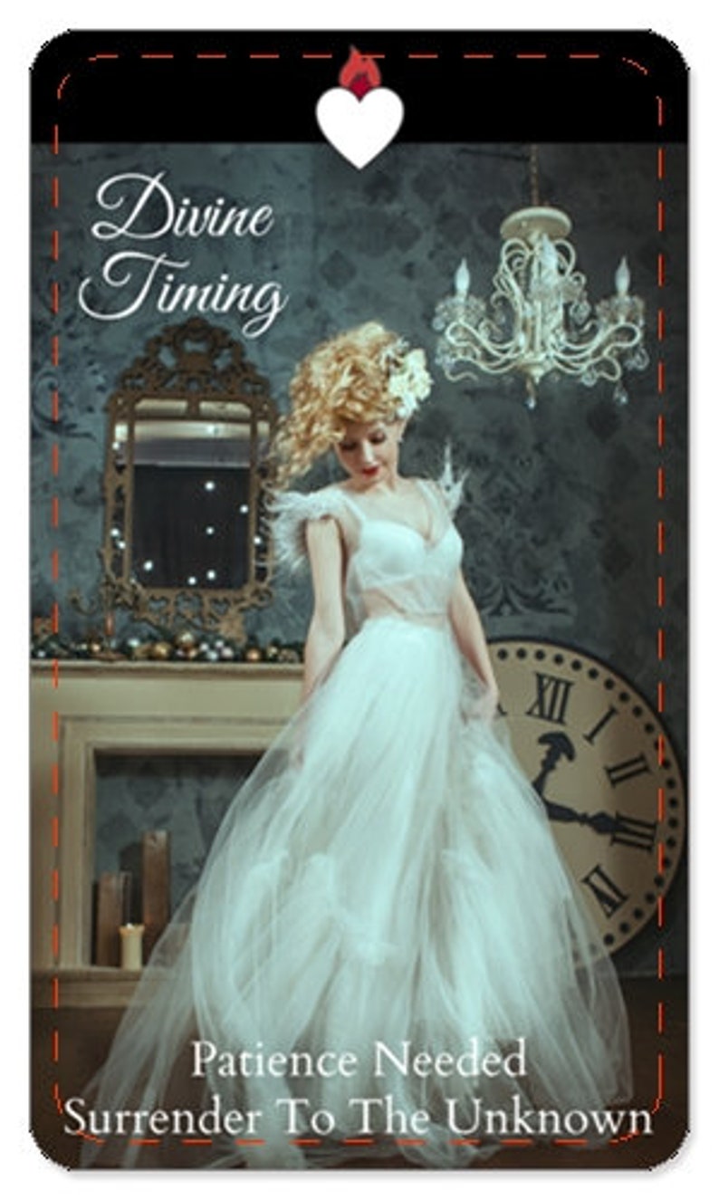 May include: A vintage-inspired tarot card with a woman in a white gown standing in front of a clock. The card is titled "Divine Timing" and has the text "Patience Needed Surrender To The Unknown" at the bottom.