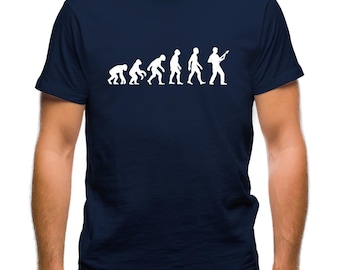 May include: A navy blue t-shirt featuring a white graphic of the evolution of man, culminating in a man playing a guitar.