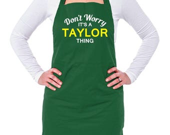 May include: Green apron with the text "Don't Worry It's a Taylor Thing" in white and yellow lettering.