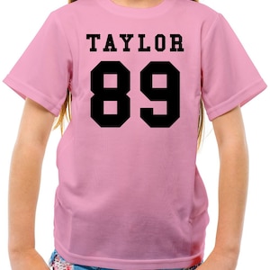 Taylor 89 - Kids Mens Womens T-Shirt - Mens Womens Kids T-Shirt - Merch Swift Gig Concert Tour Dates Eras 1989