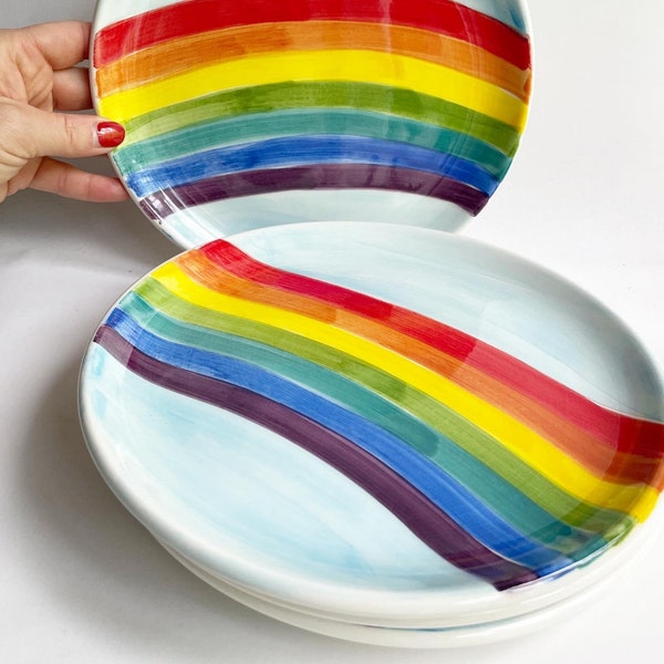 Rainbow cake and serving plates