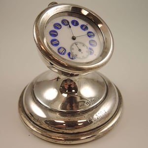 Reloj de bolsillo inglés con base de plata y esfera azul, c1905