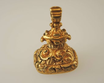Victorian gilt cased seal set with a red stone c1850