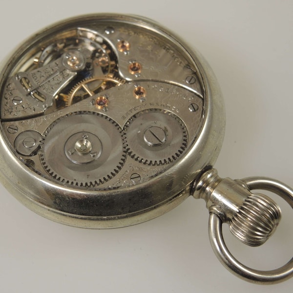 18s 21 Jewel Elgin pocket watch in a glass salesman case c1904