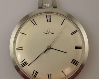 Elegante reloj de bolsillo Omega vintage de acero, c1968