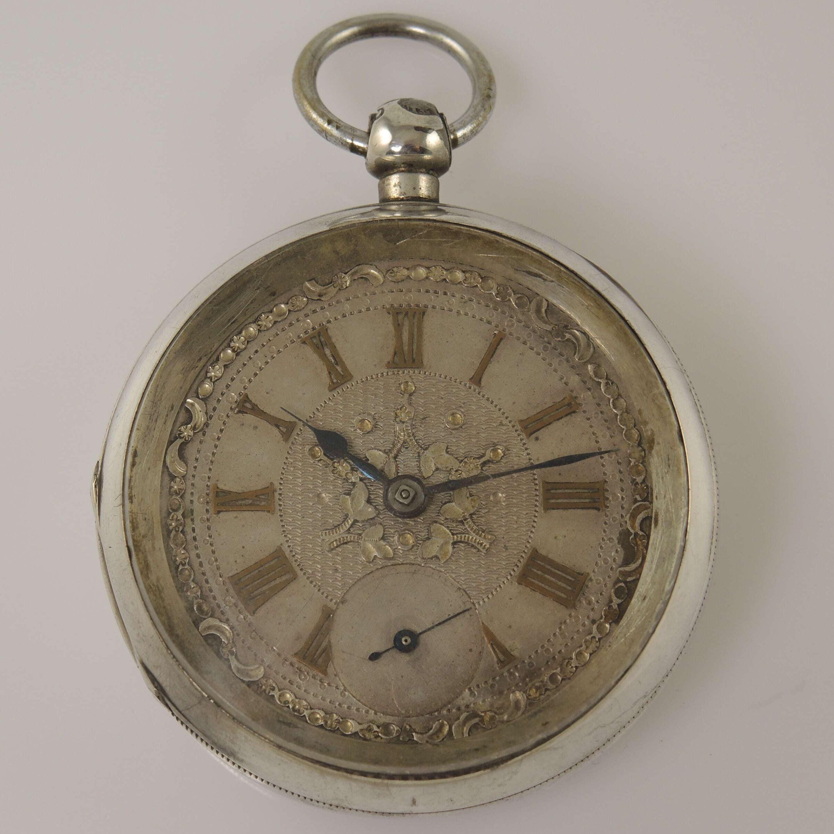 Orologio da tasca inglese in argento con carica a chiave e