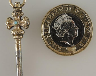 Vergulde en turquoise set CROSS Pocket Watch Key. Circa 1880