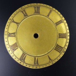 English Gilt metal dial c1810