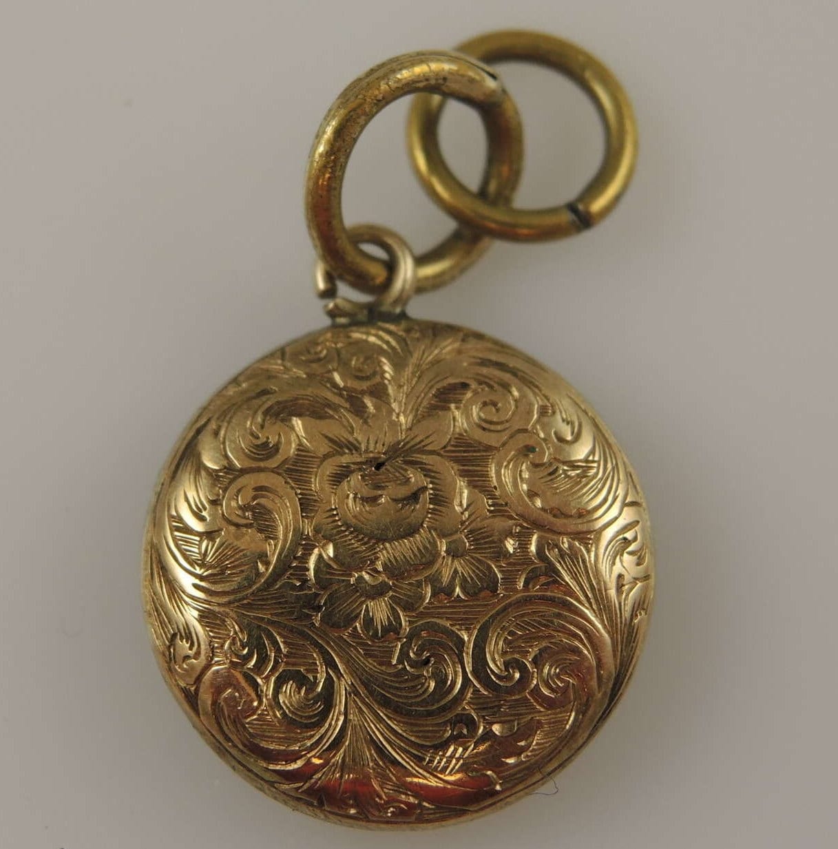 Small gold cased fob locket pendant c1890
