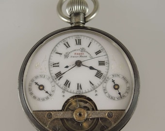Reloj de bolsillo Gunmetal Hebdomas de días con calendario c1910
