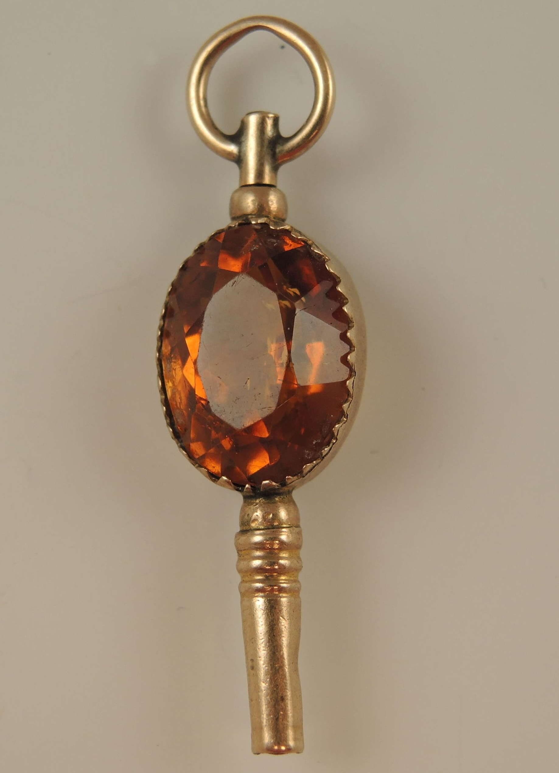Victorian solid 9K gold and stone set pocket watch key c1890