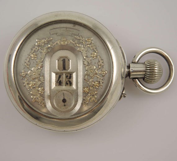 Reloj de bolsillo digital Jump de plata vintage, c1910 España