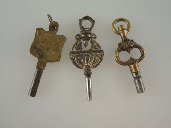 Antique pocket top watch keys