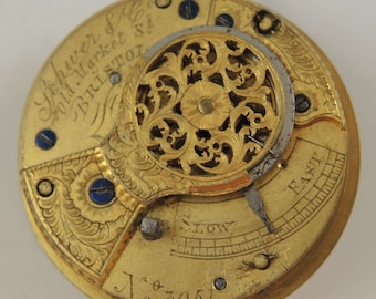 May include: A gold pocket watch with an intricate design and the inscription "Schwier & Co. Gold Market St. Bristol" on the face. The watch has a regulator for adjusting the time and a number "3051" on the bottom.