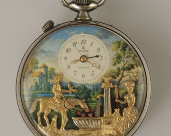 Vintage silver musical automata pocket watch by Reuge