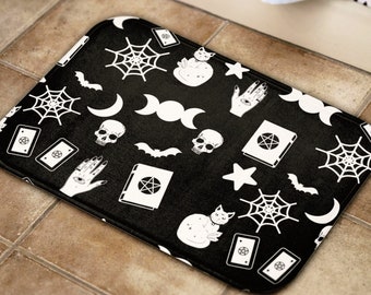 Gothic bathroom decor, Goth bath mat with witchcraft symbols, Witchy bath mat rug containing skulls moon spell book bat and others