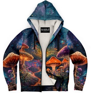 May include: A black zip-up hoodie with a psychedelic mushroom forest print. The hoodie has a fleece lining and a kinkskull logo tag.